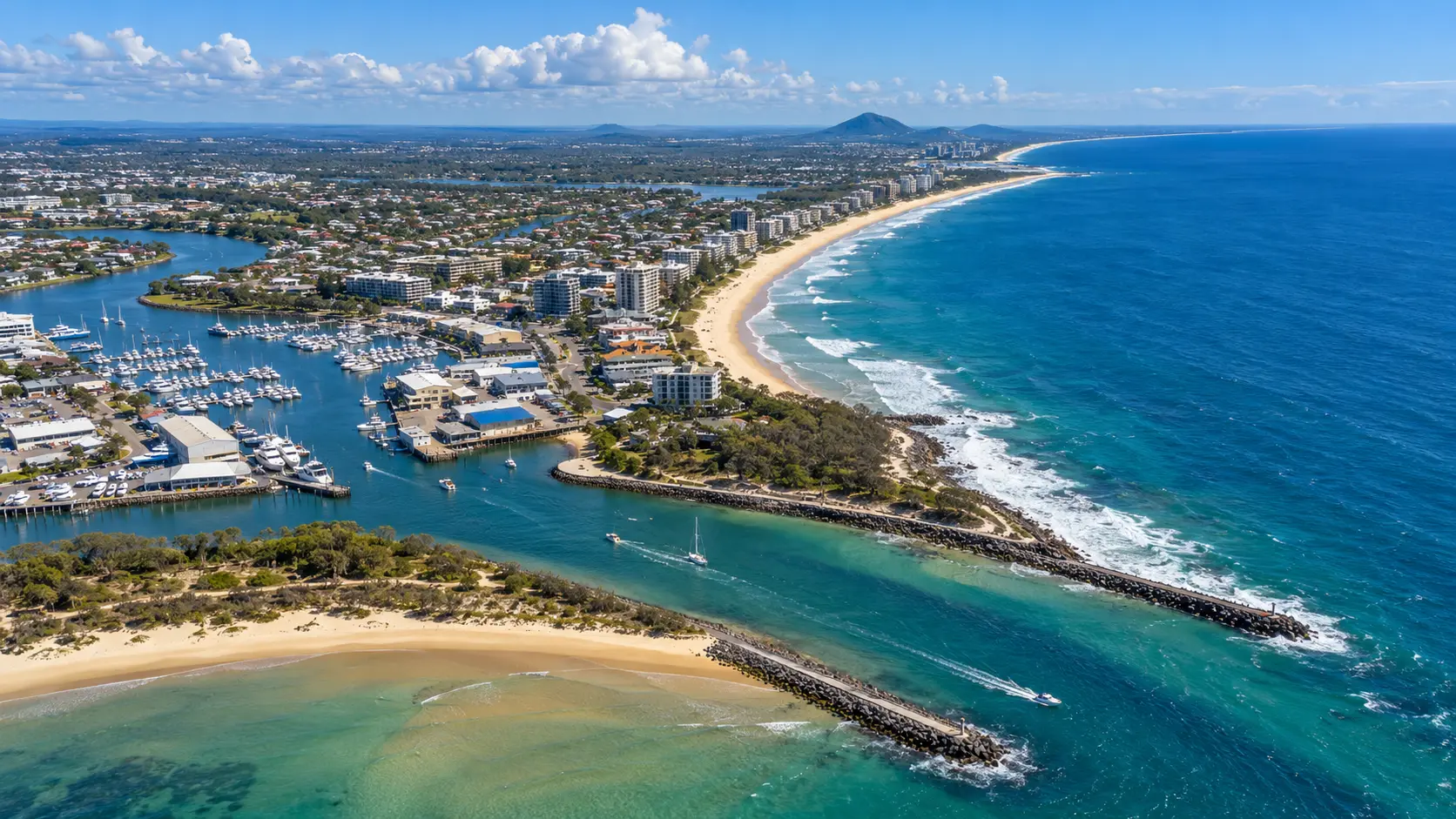 Aerial view across Mooloolaba's coastline, Mooloolah River and harbour and Point Cartwright